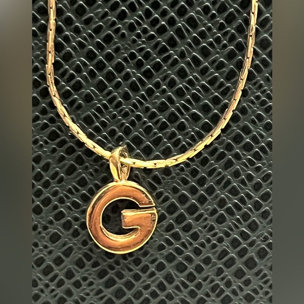 Givenchy Vintage Gold Rounded Letter G
Logo Charm Necklace